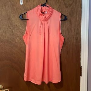 Beautiful coral blouse for spring/ summer and sleeveless. Shiny, silky like